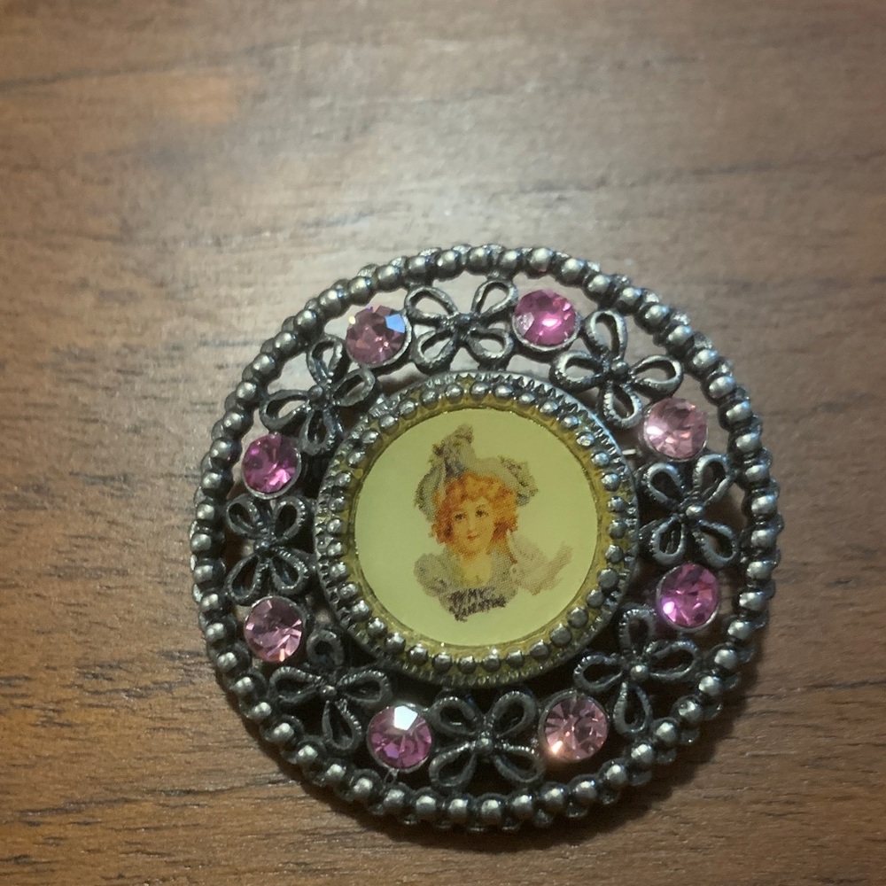 Vintage-Style Pink Crystal Filigree Brooch with Cherub Portrait